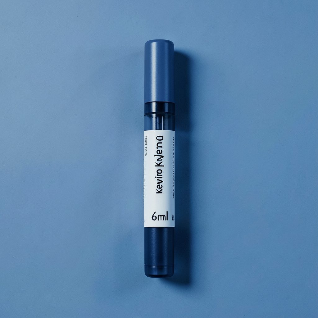 A duotone photograph in muted teal and navy tones showing a weight-loss injection pen on a clean clinical surface with soft ambient light